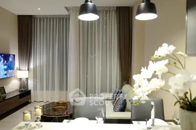 Modern living room with elegant decor and ambient lighting