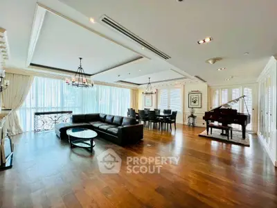 Luxurious open living room with grand piano and elegant decor