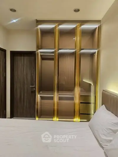 Luxurious bedroom with elegant built-in wardrobe and ambient lighting