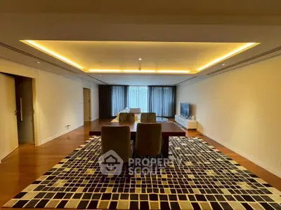 Spacious modern living room with elegant lighting and stylish decor