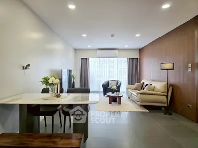 Spacious modern living room with elegant decor and natural light