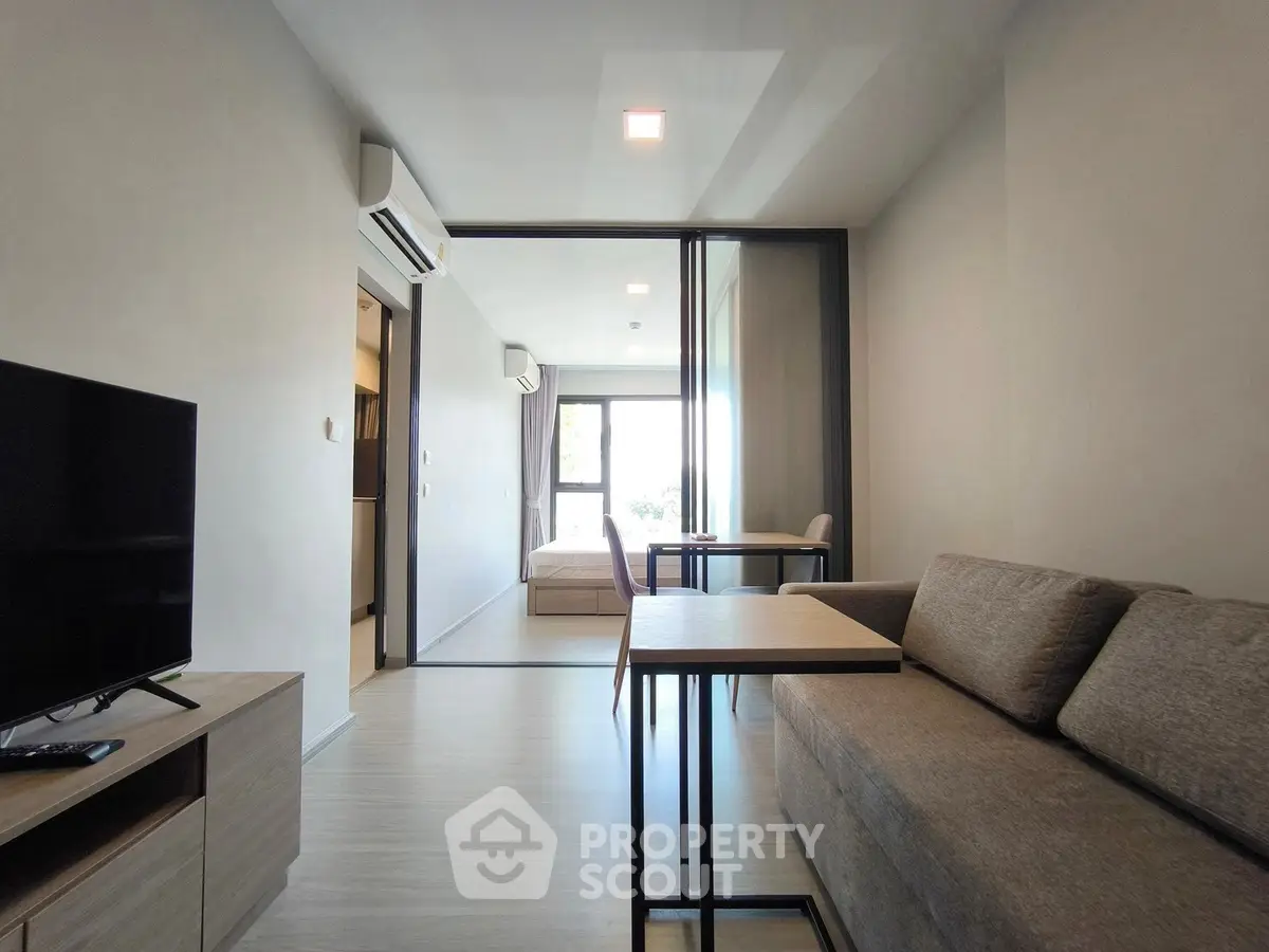 Modern living room with sleek furniture and open layout