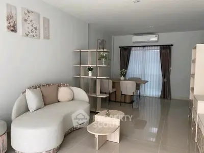 Modern living room with stylish furniture and open layout