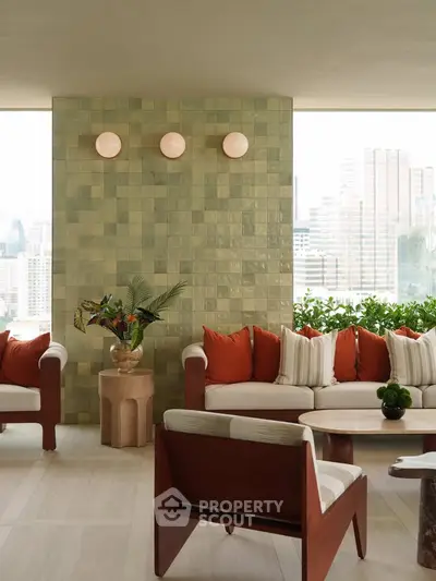 Luxurious living room with modern decor and city view, featuring stylish furniture and elegant lighting.