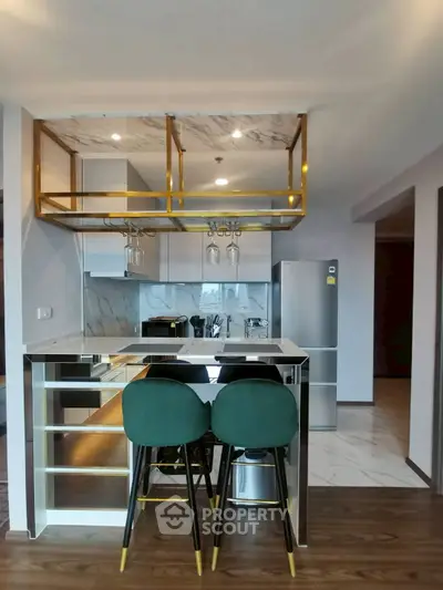 Modern kitchen with sleek design and stylish bar seating