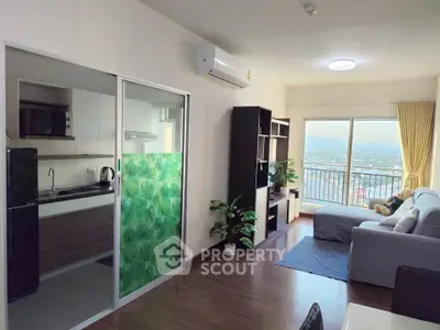 Modern open-layout living room with balcony and kitchen, featuring stylish decor and stunning city view.