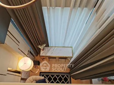 Elegant modern living room with high ceilings and luxurious decor