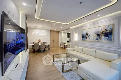 Luxurious modern living room with elegant decor and spacious dining area, perfect for entertaining.