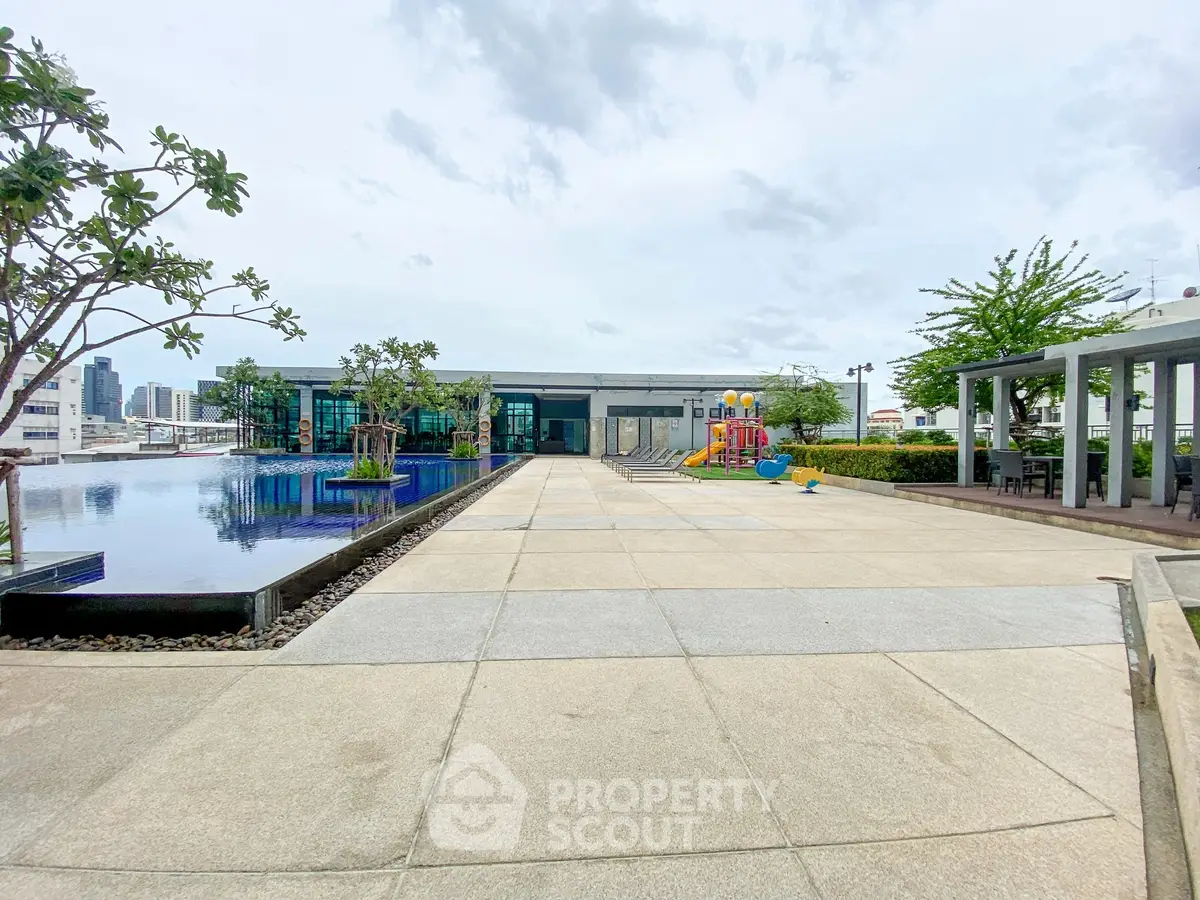 Luxurious rooftop pool area with city views and modern amenities.