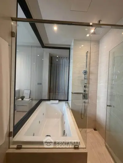 Luxurious bathroom with modern bathtub and glass shower enclosure