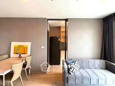 Modern living room with stylish furniture and open kitchen layout
