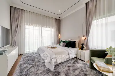 Luxurious modern bedroom with plush carpet and elegant decor