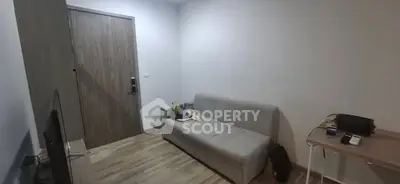 Cozy living room with modern decor and comfortable sofa