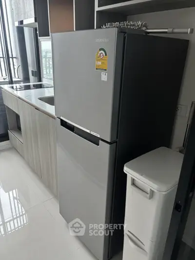 Modern kitchen with sleek appliances and stylish cabinetry