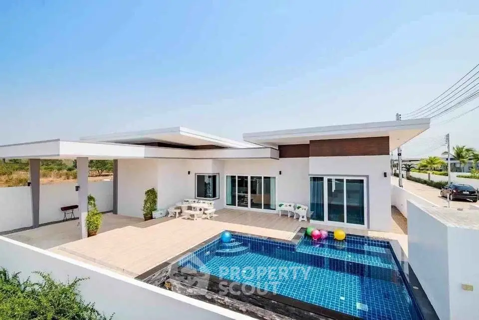 Modern villa with private pool and spacious terrace in a serene neighborhood.