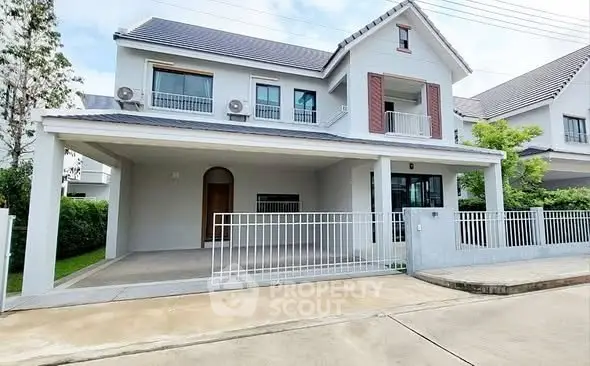 Elegant two-story house with spacious driveway and modern design