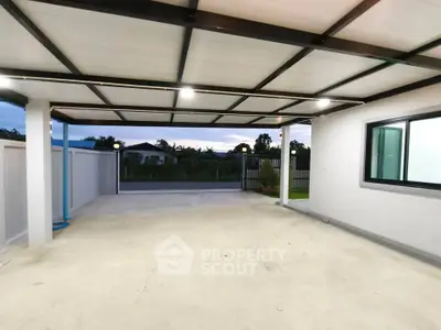 Spacious covered parking area with modern design and scenic view
