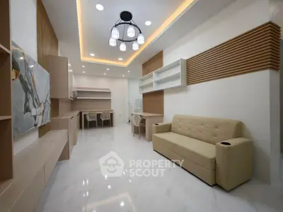Modern living room with elegant lighting and stylish furniture
