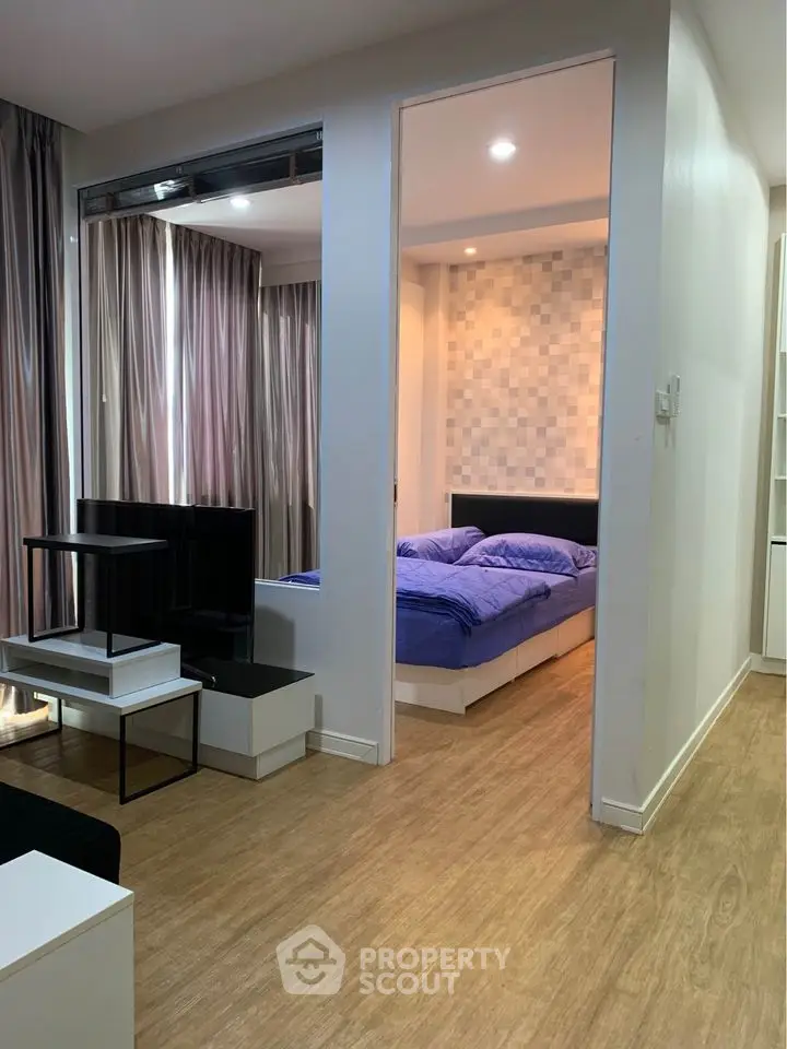 Modern studio apartment with cozy bedroom and stylish decor