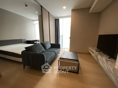 Modern studio apartment with stylish furniture and natural light