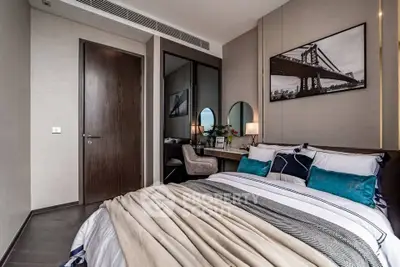 Luxurious bedroom with modern decor and stylish furniture in a high-end apartment.