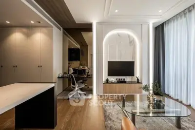 Modern living room with stylish decor, glass coffee table, and built-in TV unit with ambient lighting.