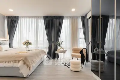 Luxurious modern bedroom with floor-to-ceiling windows and elegant decor