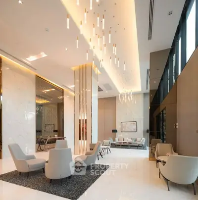 Luxurious modern living room with elegant lighting and stylish seating area.