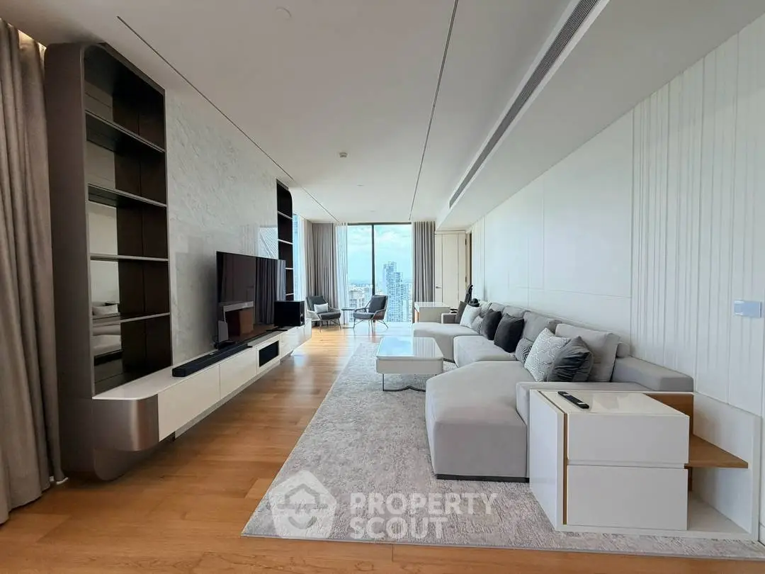 Luxurious modern living room with sleek furniture and stunning city view.