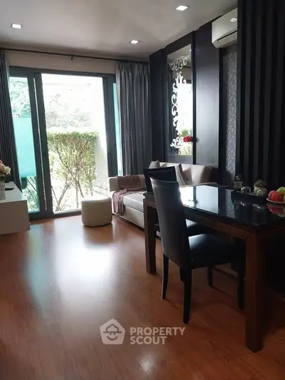 Elegant living room with modern decor and garden view