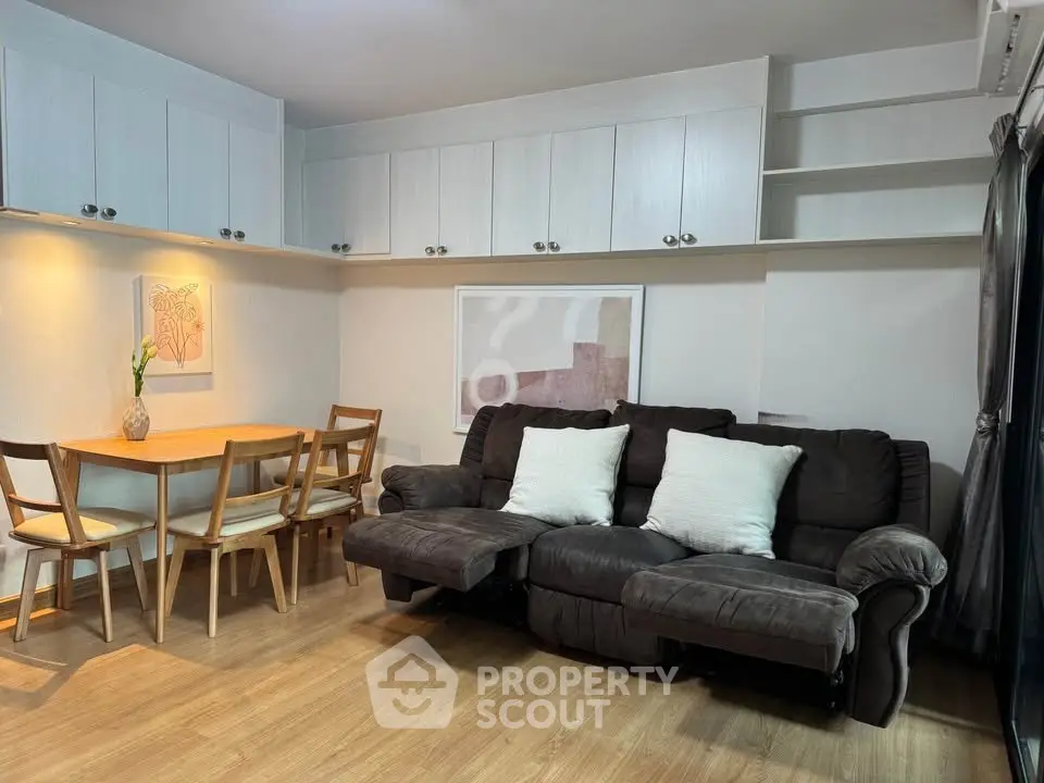 Cozy living room with modern furniture and stylish decor, perfect for relaxation and entertaining.