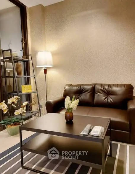 Cozy living room with leather sofa and modern decor