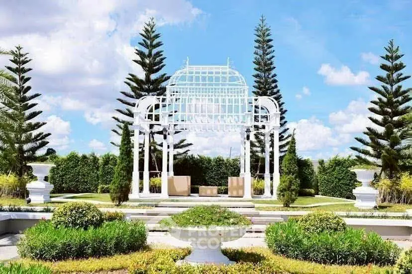 Stunning garden with elegant white gazebo and lush greenery, perfect for outdoor relaxation and events.