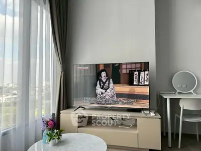 Modern living room with TV, stylish furniture, and large window with city view.