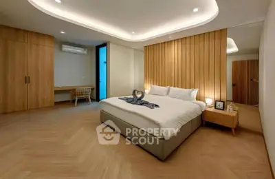 Luxurious modern bedroom with elegant wooden accents and ambient lighting