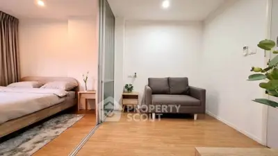 Modern studio apartment with cozy bedroom and stylish living area