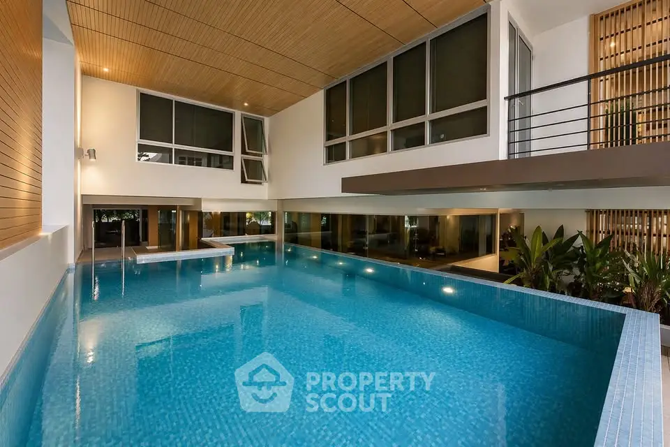 Luxurious indoor pool with modern design and elegant finishes in a high-end residential property.