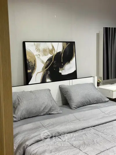 Modern bedroom with stylish decor and comfortable bedding