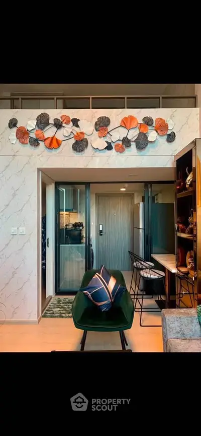 Stylish modern living room with artistic wall decor and cozy seating area