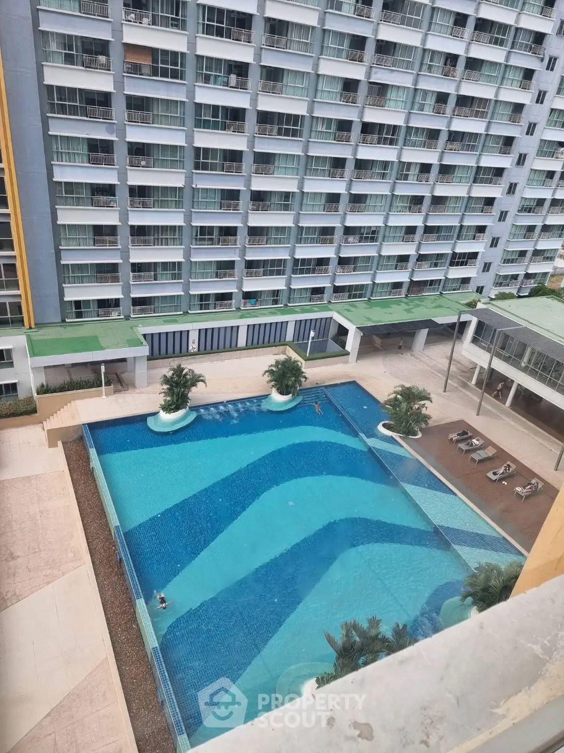 Luxurious high-rise apartment with stunning pool view and modern amenities