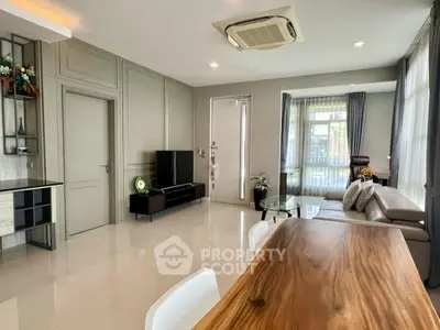 Modern living room with sleek furniture and natural light