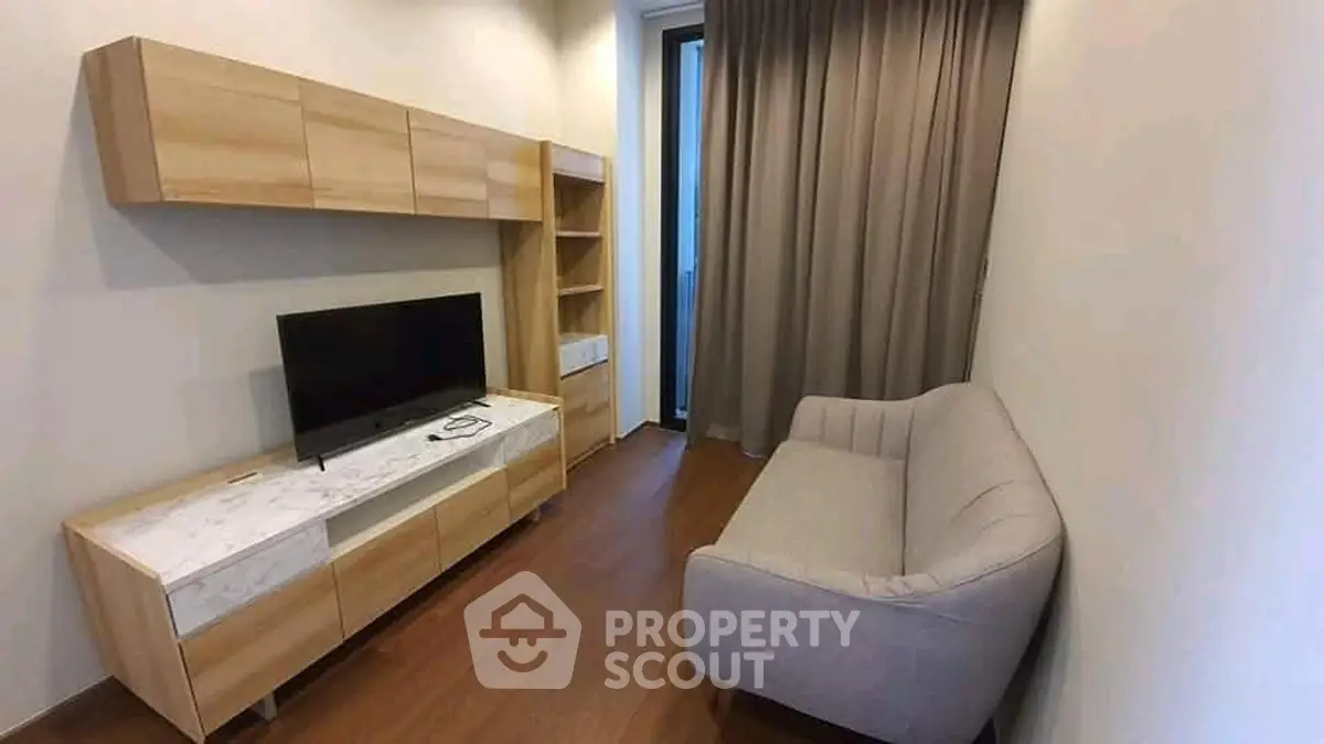 Modern living room with sleek wooden furniture and cozy sofa