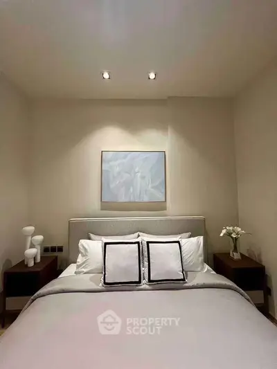 Elegant bedroom with modern decor and cozy ambiance