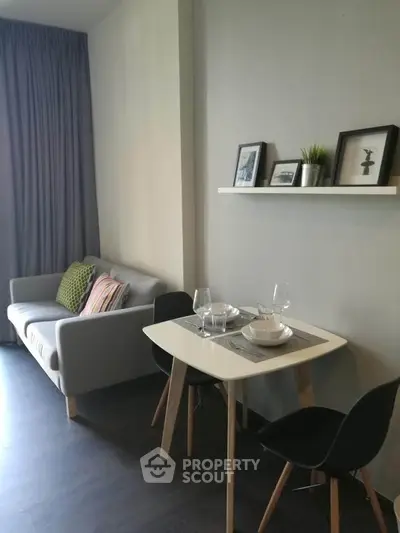 Modern living room with cozy dining area and stylish decor