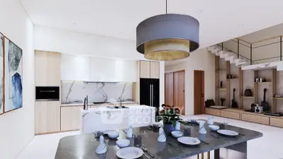 Luxurious open-plan kitchen and dining area with modern decor and elegant lighting