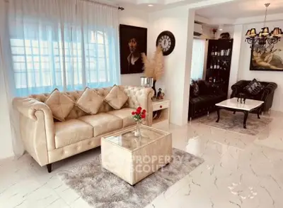 Elegant living room with plush beige sofa and chic decor