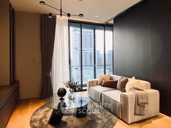 Modern living room with city view, stylish furniture, and elegant decor.