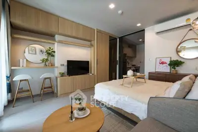 Modern studio apartment with stylish decor and open layout