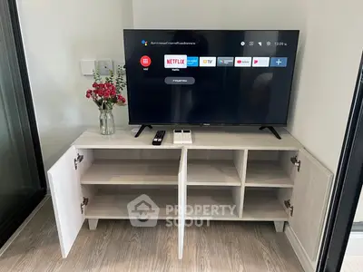 Modern living room with sleek TV stand and smart TV setup