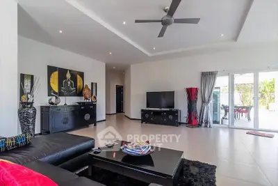 Spacious modern living room with stylish decor and natural light
